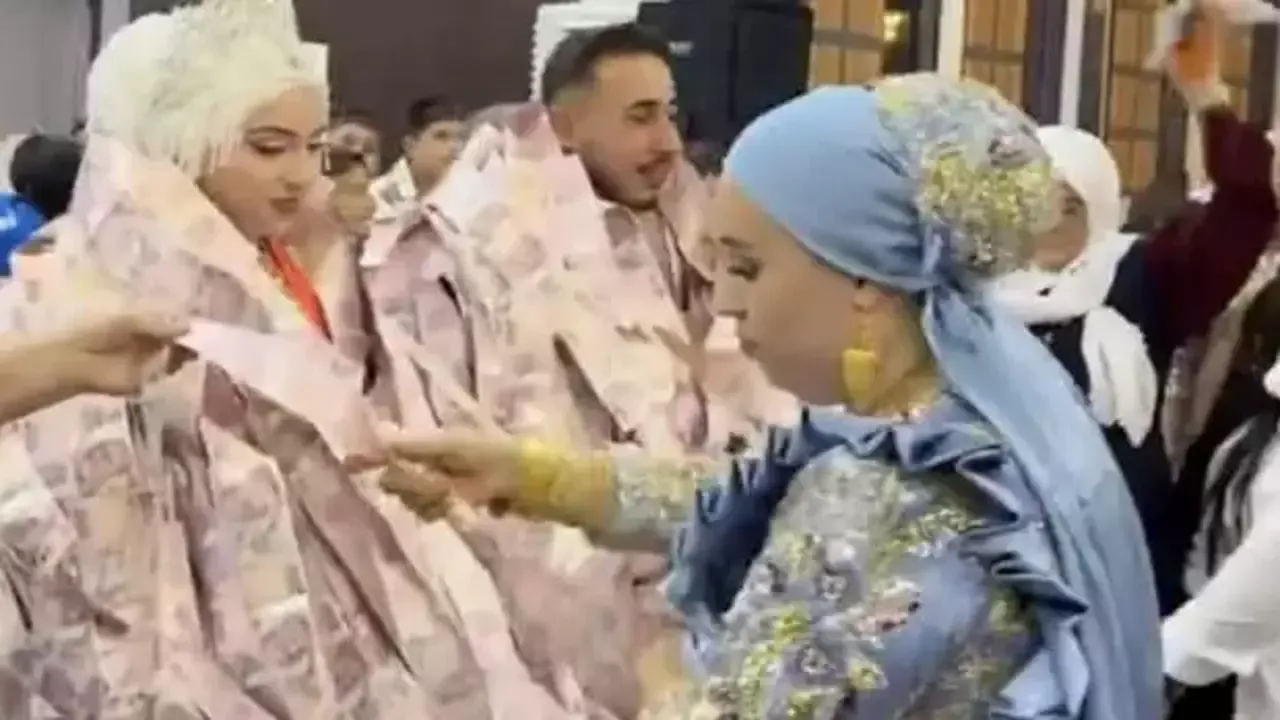 Damadın giydiği para yeleği gündem oldu