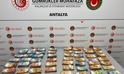 Bebek bezlerinin arasından servet çıktı! Antalya Havalimanı'nda 20 milyon liralık para ele geçirildi
