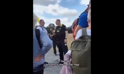 Kendi ülkesinde, ülkesinin bayrağını açamadı! Alman tur rehberine polis müdahale etti