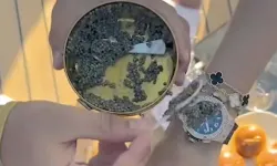 Bodrum'da görgüsüzlük şovu! Lüks saatin üzerine havyar döküp yediler
