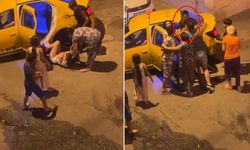 2 kadın, bıçak çeken genç kadını taksi içinde böyle darbettiler!