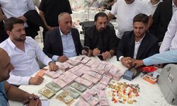 Takı değil servet takıldı: Para sayma makinesi getirdiler bavullarla taşıdılar