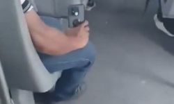 Otobüste gizli çekim skandalı! Kadın fark edince karşılık verdi