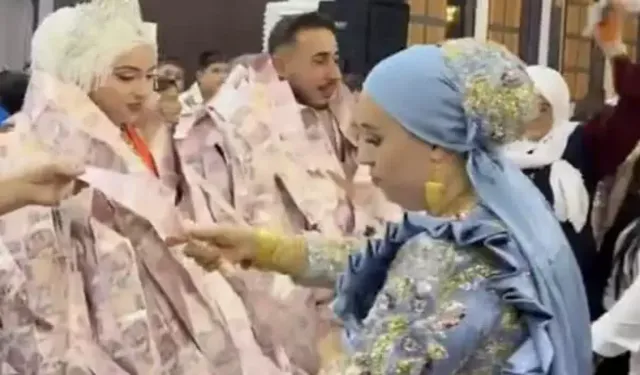 Damadın giydiği para yeleği gündem oldu