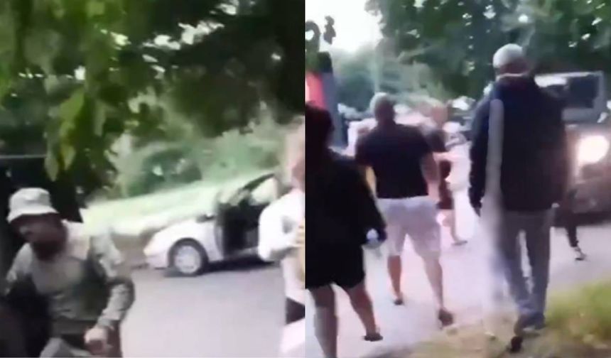 Ukrayna’da parkta oturan adamı zorla askere götürmek istediler