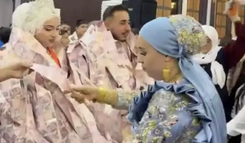Damadın giydiği para yeleği gündem oldu