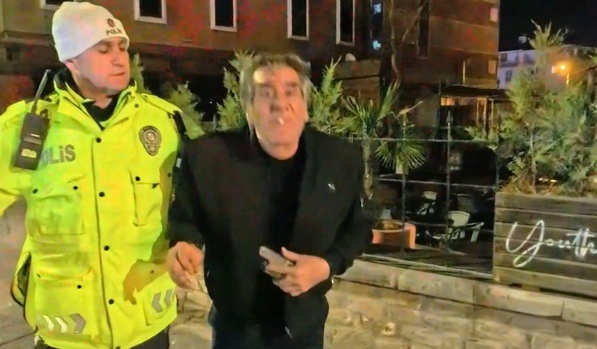 2.14 promil alkol çıktı! Gazeteciye el sallayıp yüzüne tükürdü: O anlar kamerada