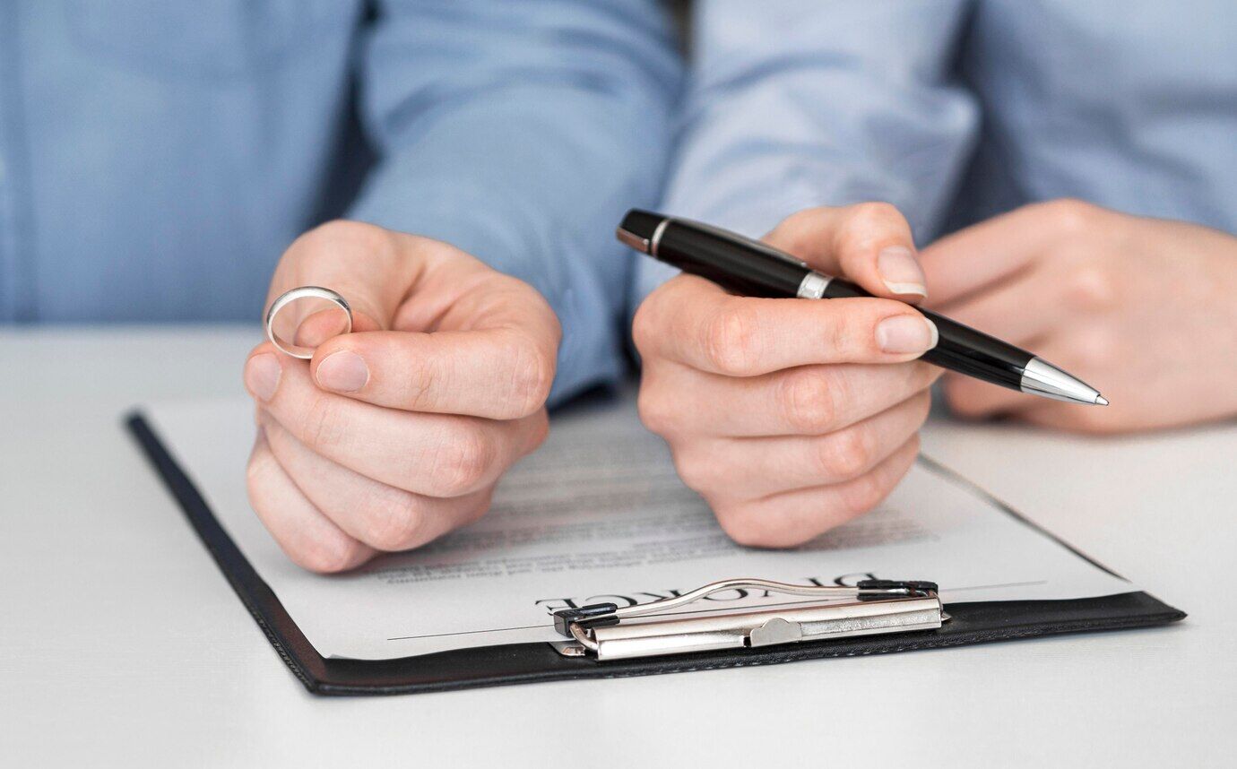 Close Up Couple Signing Divorce Contract 23 2148536073