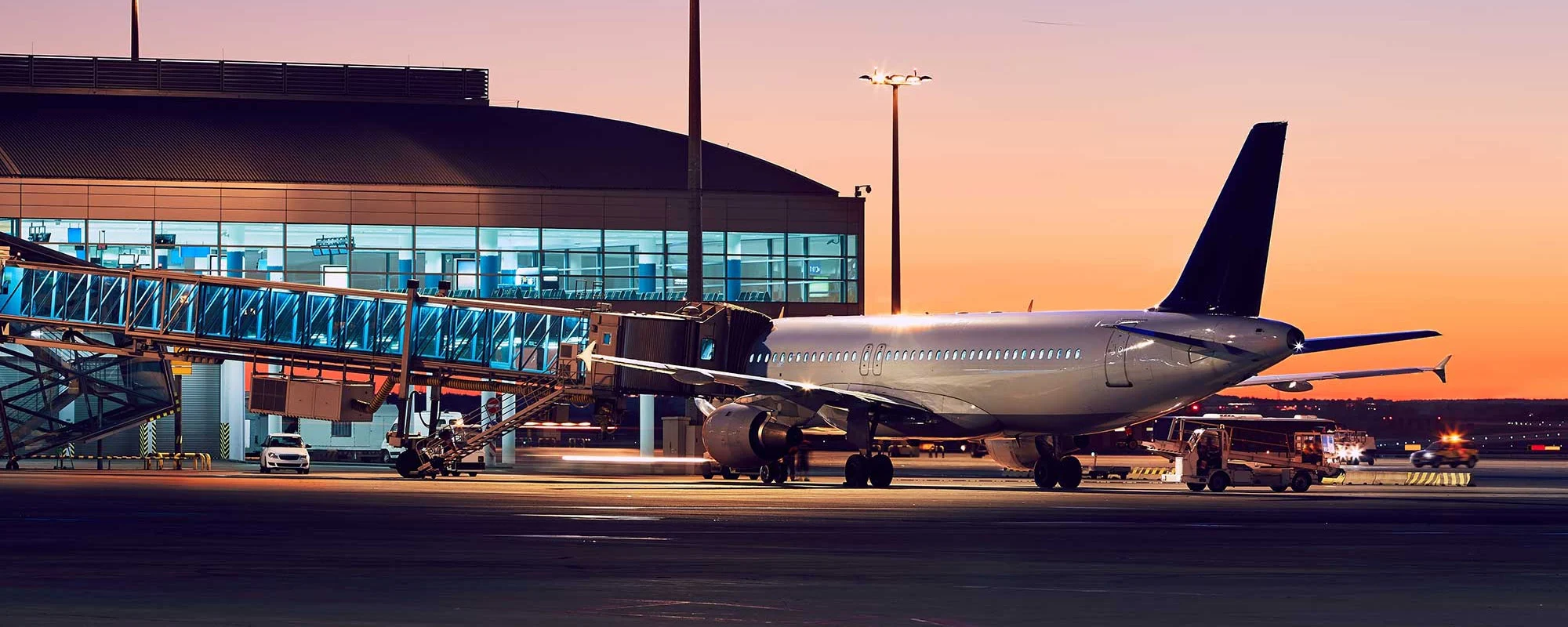 Plane At An Airport Terminal Airport Planning Hero